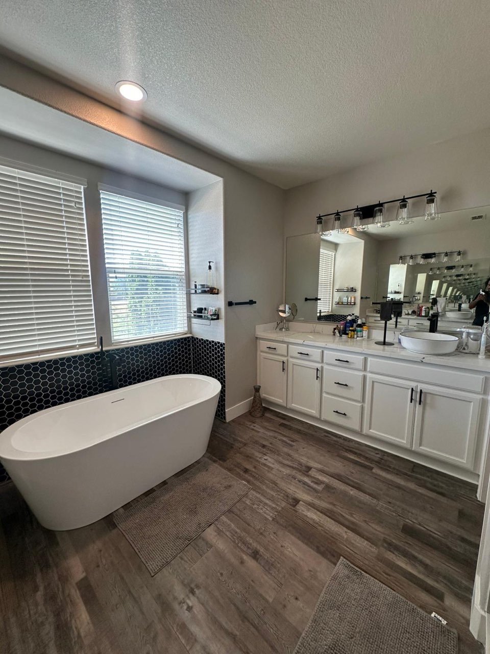 Custom bathroom remodel — modern fixtures, large-format tile, and walk-in shower by our bathroom remodeling contractors