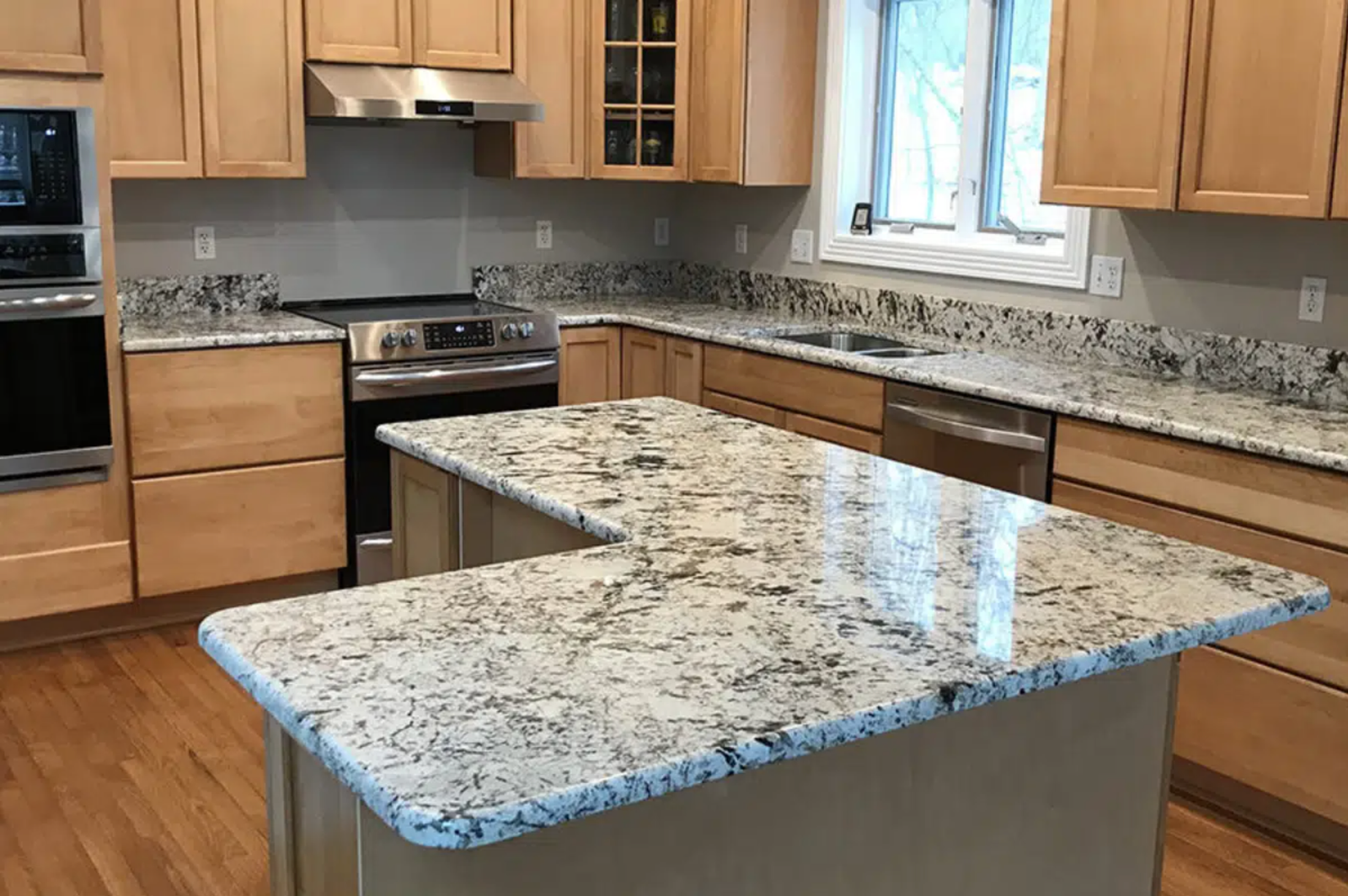 Granite countertop installation detail — precision edge profile and seamless seam by our kitchen countertop installation team